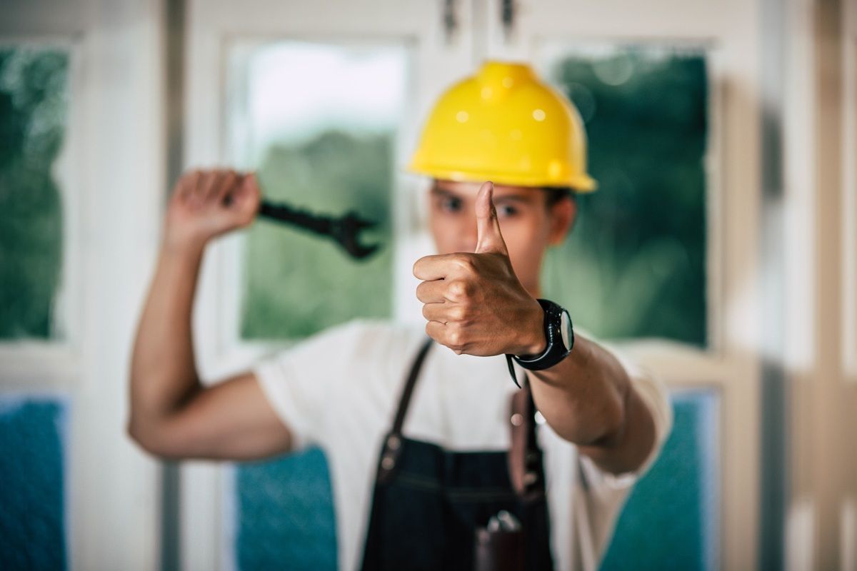 A Jerco installer giving a thumbs up